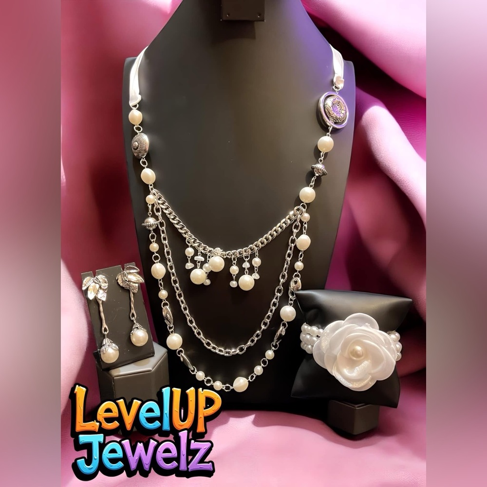 Elegant Silver and White Multi-Strand Necklace with Charms